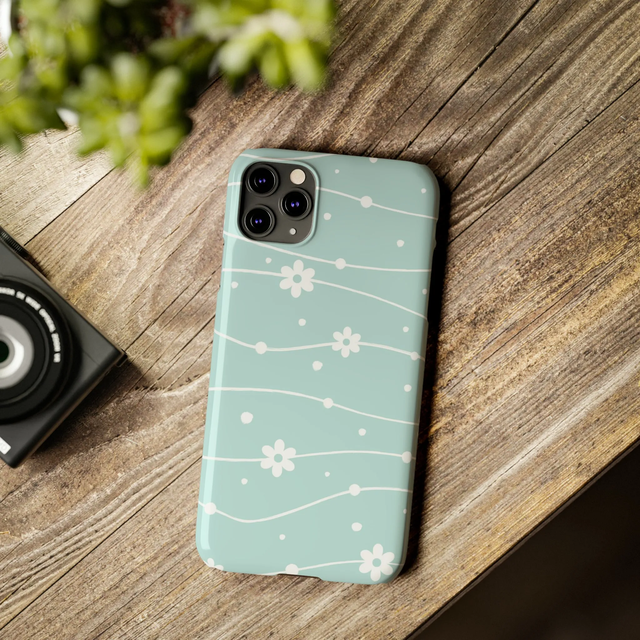 Blue background and White Daisies Polka Dots Design Sleek Elegance Wireless-Charging Compatible Phone Case Slim Phone Case compatible with over 20 iphone models