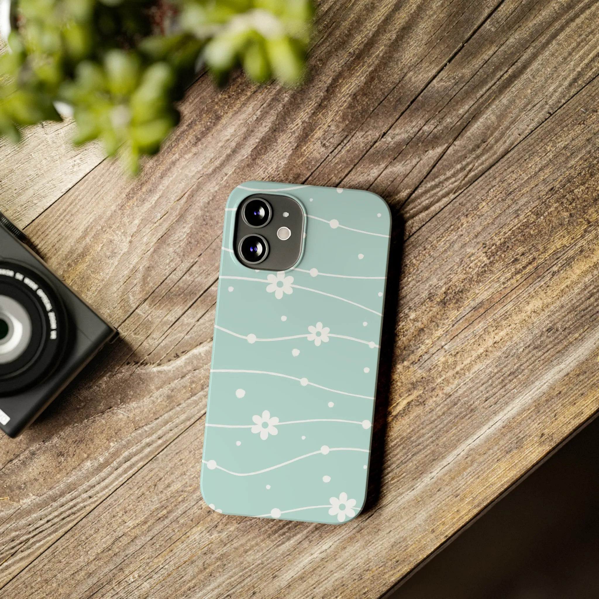 Blue background and White Daisies Polka Dots Design Sleek Elegance Wireless-Charging Compatible Phone Case Slim Phone Case compatible with over 20 iphone models