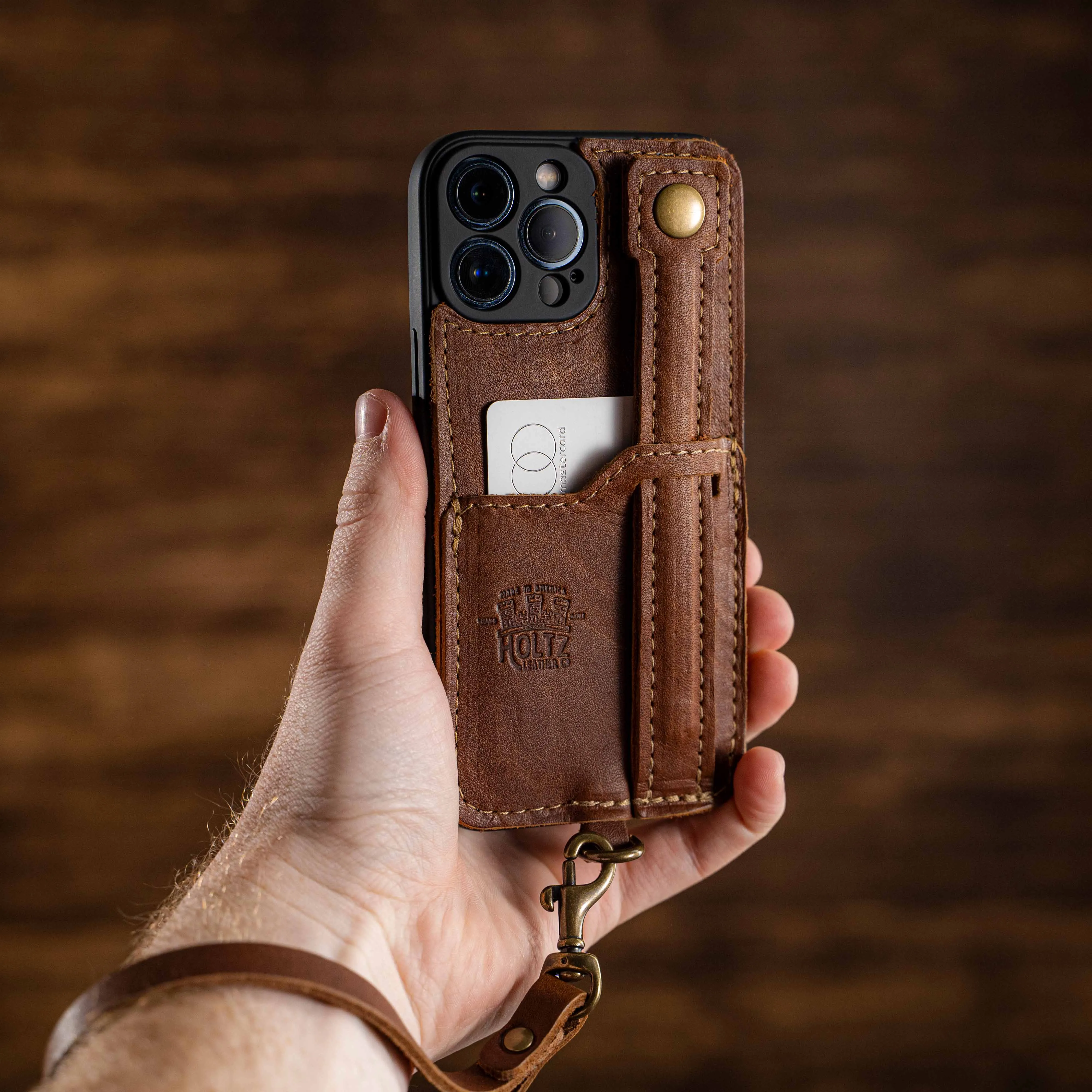 The SWITCH 4-IN-1 Leather Phone Case - WALLET, KICKSTAND & LOOP for iPhone®